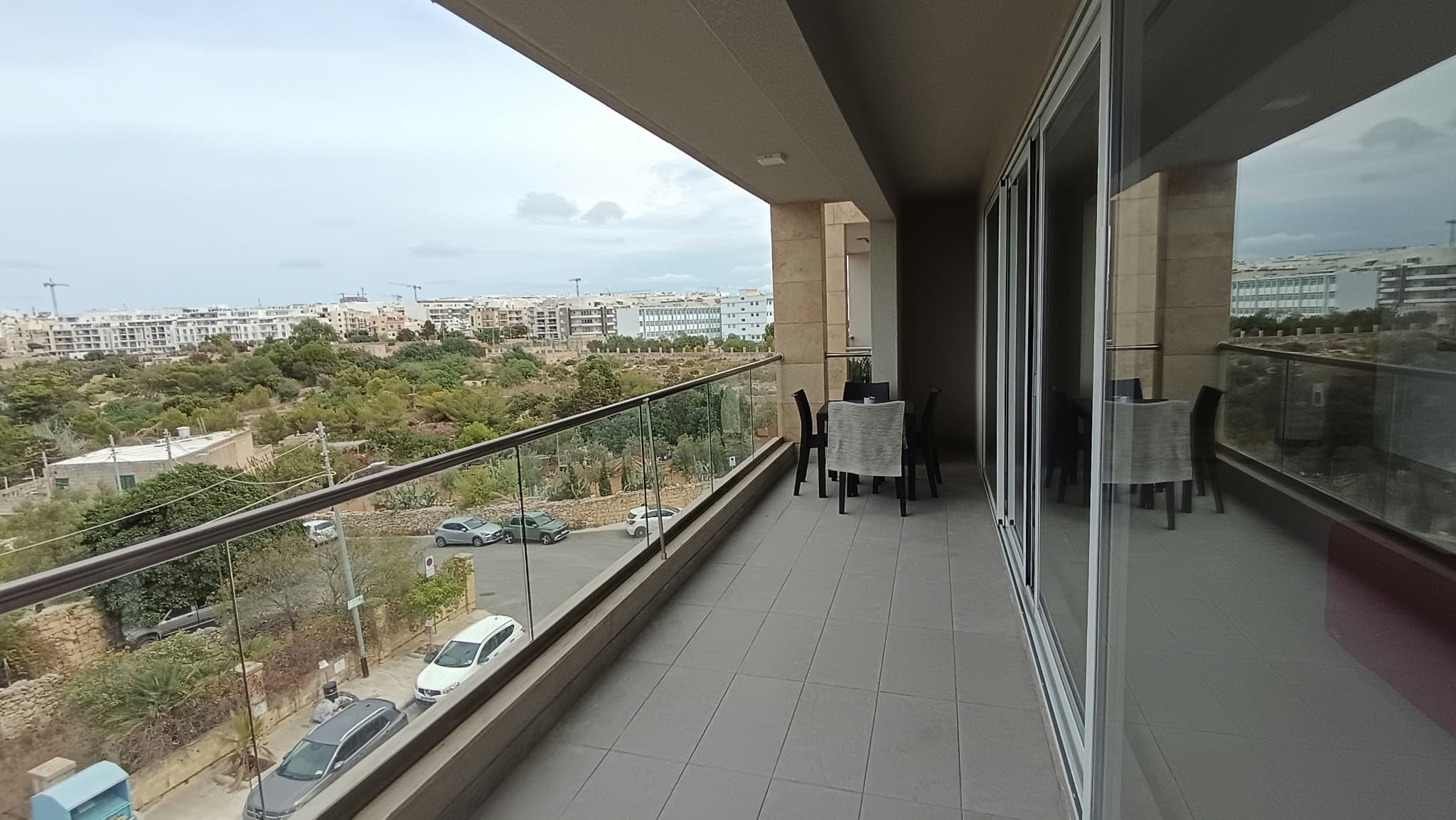 Three Bedroom Apartment with a Large Terrace and Valley Views in Mosta - Image 1
